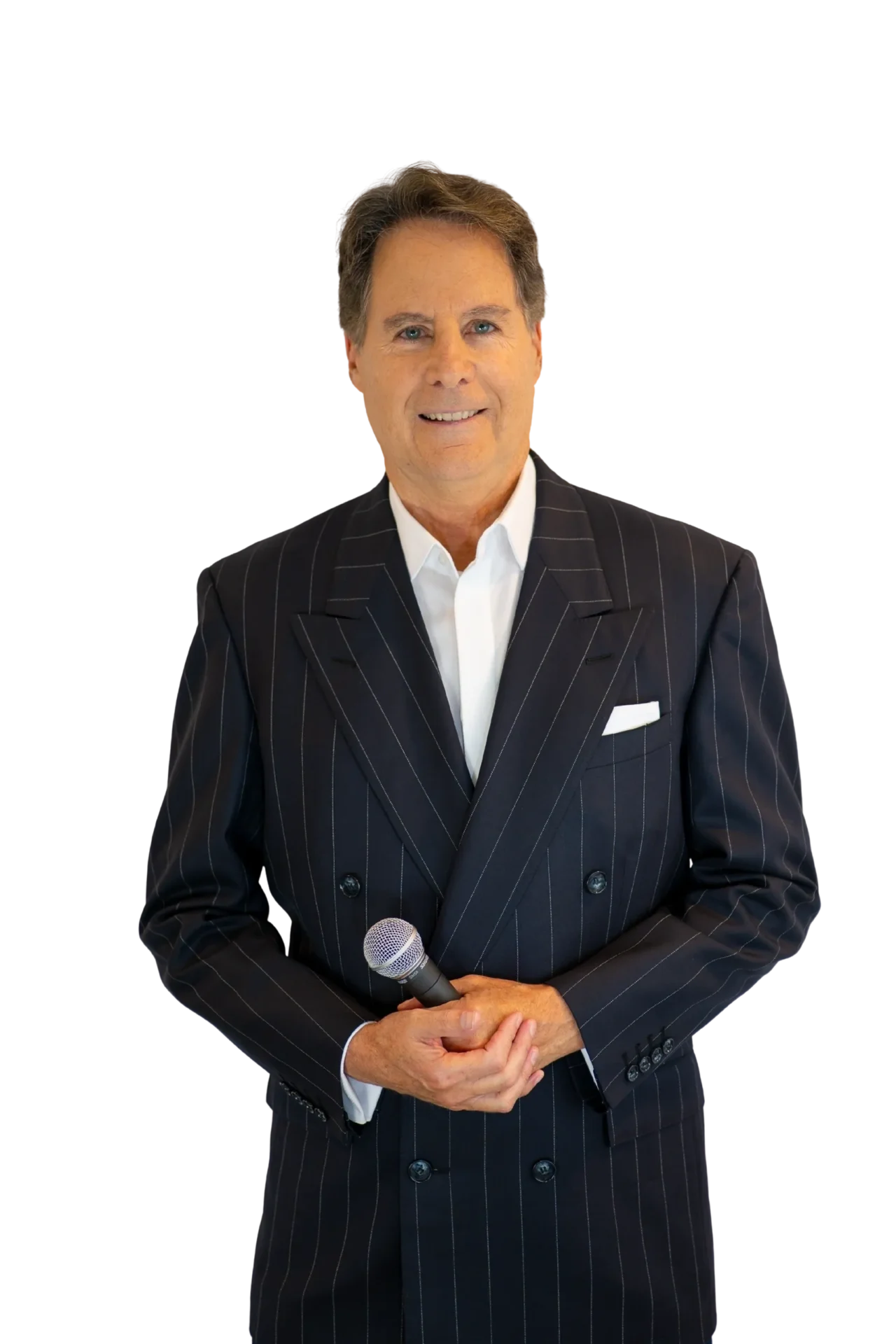 Smiling man in pinstripe suit holding microphone